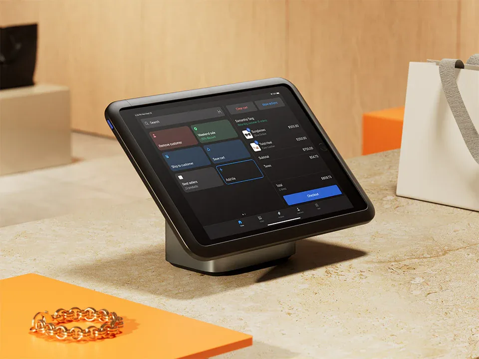 A Shopify POS tablet on a store counter